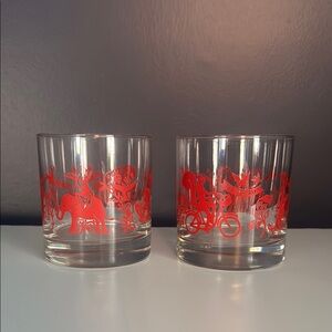 Elegant Glass Tumbler with Red Animal Motif